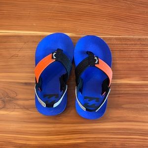 Billabonic toddler boys flip flops. US size 5. Blue, black and orange.